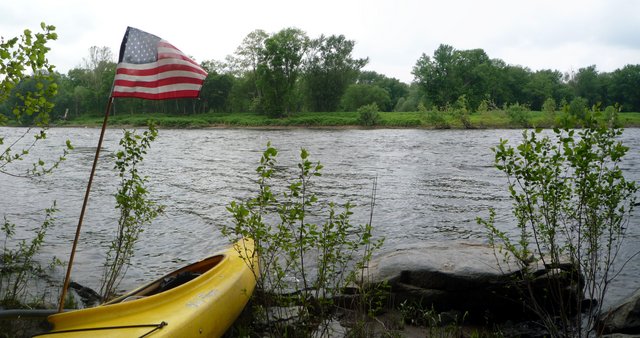 Kayak beached beside Delaware River