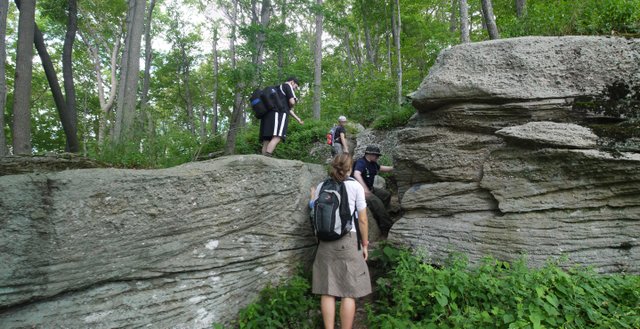 Hikers scramble up rocky ridges on Peekamoose Mountain