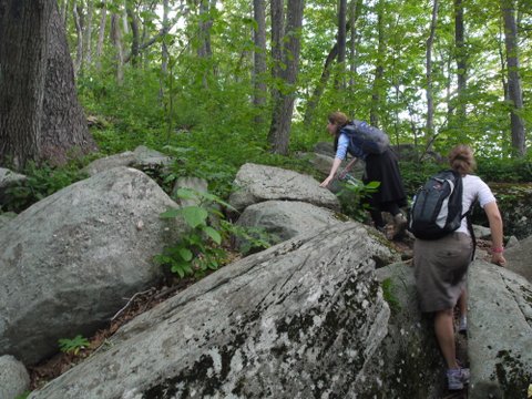 Hikers scramble up rocky ridges on Peekamoose Mountain