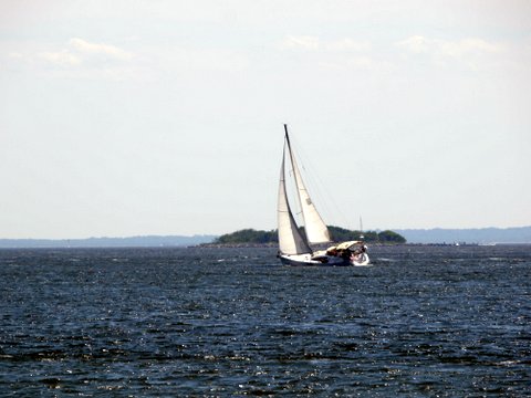 Sailboat passing east of Hoffman Island, Lower New York Bay, New York