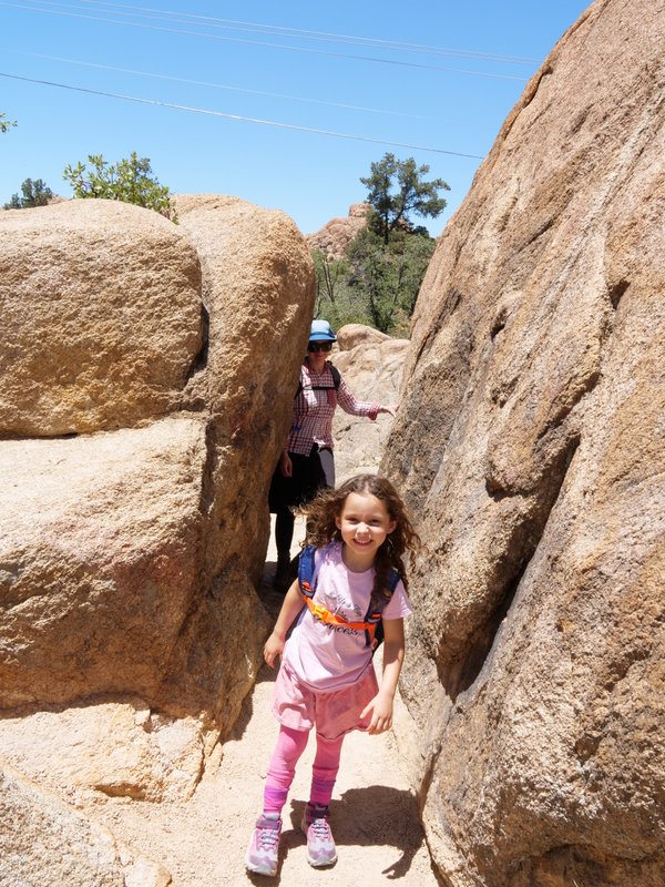 Shaina and Batya squeeze through the Flume Trail, Prescott, Arizona